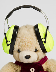 Image showing teddy bear with ear protection