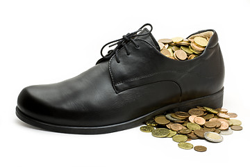 Image showing black business shoe with money