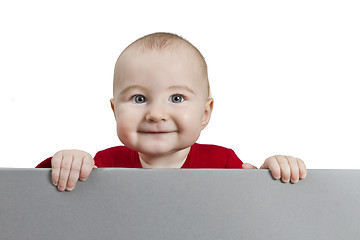 Image showing young child holding shield