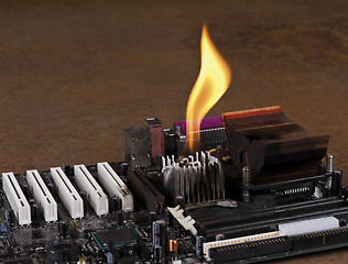 Image showing melting heat sink on computer board