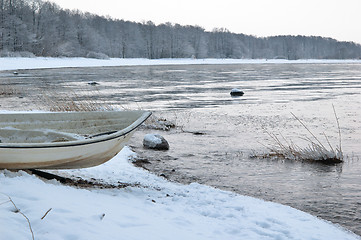 Image showing Winter landscape with a fishing boat on seacoast