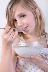 Image showing smiling child with a bowl of milk porridge