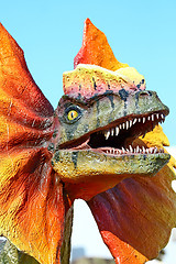 Image showing Dilophosaurus dinosaur with orange collar