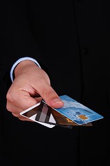 Image showing Handing Credit Cards