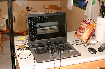 Image showing Laptop on the kitchenbank