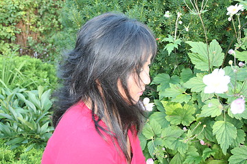 Image showing Black-haired girl in profile