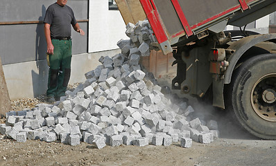 Image showing Unloading cobbles