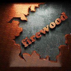 Image showing red wood word on concrete