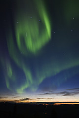 Image showing Aurora swirling in the sky