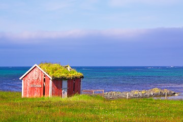 Image showing Fishermans shed with sod roof