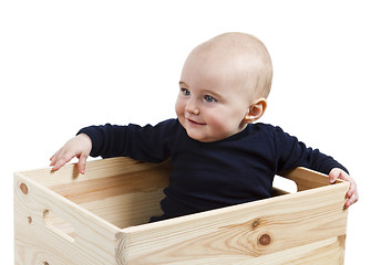 Image showing toddler in wooden box