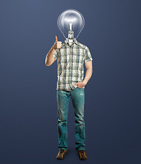 Image showing full length man with lamp shows well done