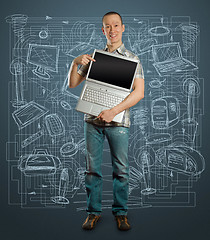 Image showing man with open laptop in his hands