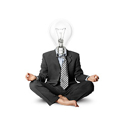 Image showing lamp-head businessman in lotus pose