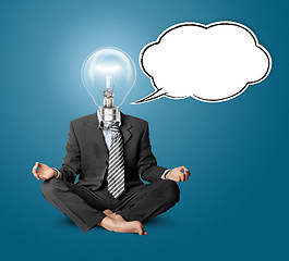 Image showing lamp-head businessman in lotus pose with speech bubble