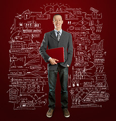 Image showing male in suit with laptop in his hands