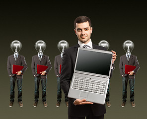 Image showing lamp head businesspeople with laptop