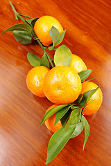 Image showing mandarin on wooden background