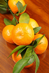Image showing mandarin on wooden background