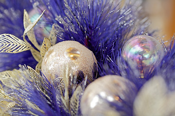 Image showing christmas ball on blue color christmas tree