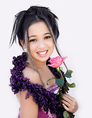 Image showing Asian girl with a pink rose