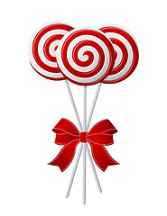 Image showing Lollipops with red ribbon