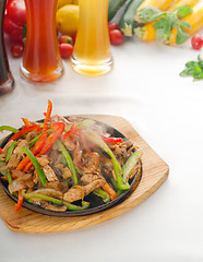 Image showing original fajita sizzling hot  on iron plate