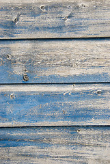 Image showing Old blue painted planks 