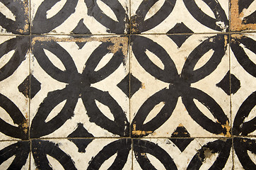 Image showing Antique floor tiles abraded backdrop in corridor.