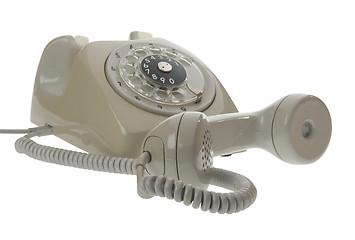 Image showing Old vintage rotary style telephone - handset off