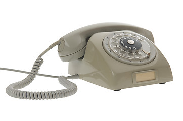 Image showing An old gray vintage rotary style telephone