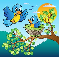 Image showing Two blue birds with tree branch