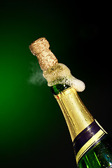 Image showing opening champagne bottle