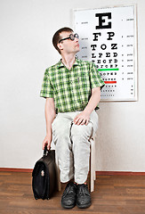 Image showing person wearing spectacles in an office at the doctor