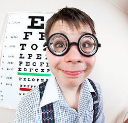 Image showing person wearing spectacles in an office at the doctor