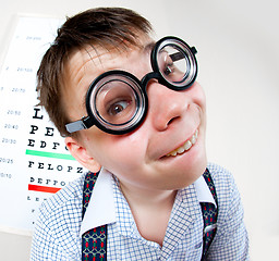 Image showing person wearing spectacles in an office at the doctor