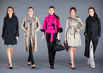 Image showing Five girls. Autumn winter collection lady's clothes