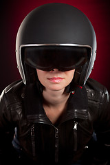 Image showing Biker girl in a helmet