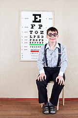 Image showing person wearing spectacles in an office at the doctor