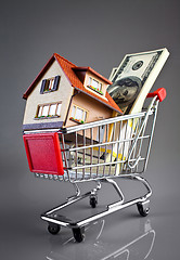 Image showing shopping cart and house