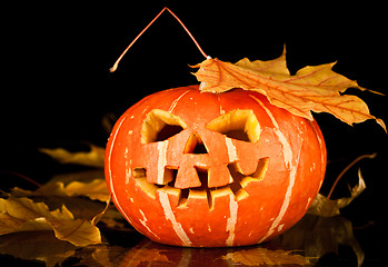 Image showing halloween, old jack-o-lantern on black