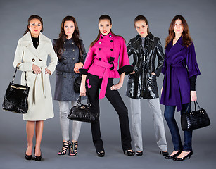 Image showing Five girls. Autumn winter collection lady's clothes