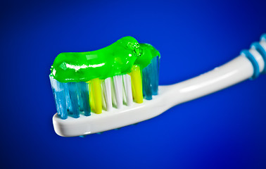 Image showing toothbrush on a dark blue background