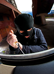 Image showing robber in a mask