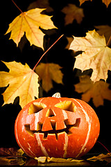 Image showing halloween, old jack-o-lantern on black