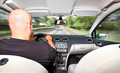 Image showing Driving a car