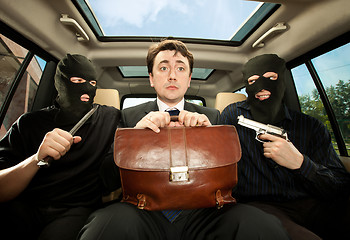 Image showing businessman grasped in hostages.