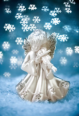 Image showing Angel with Blue Holiday Background