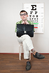 Image showing person wearing spectacles in an office at the doctor