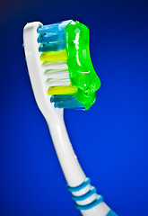 Image showing toothbrush on a dark blue background